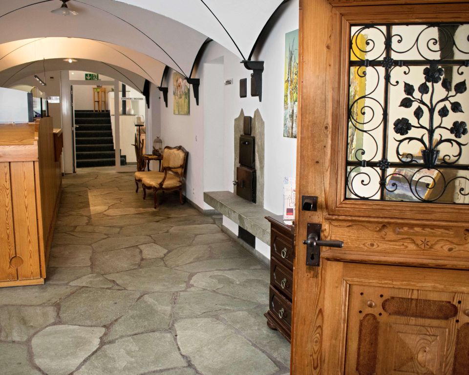 Hotel hallway with vaulted ceiling